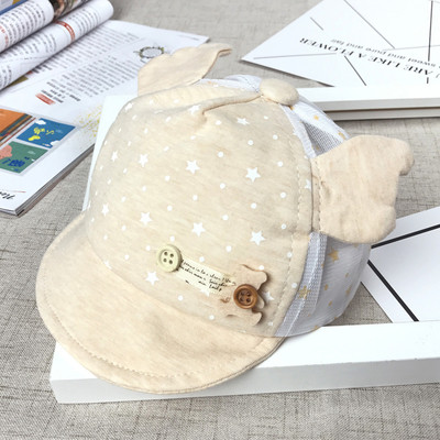 Бебешка шапка с козирка и декорация в четири цвята