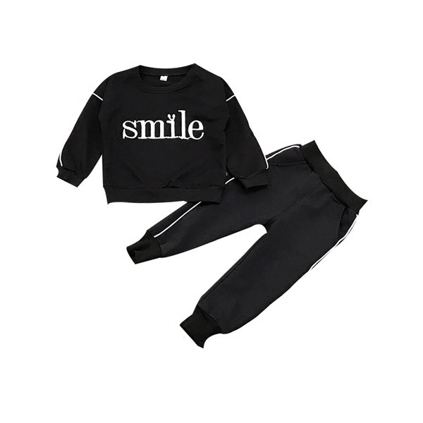Детски спортен ежедневен комплект за момичета от две части-блуза+пантаон с надпис в черен и бял цвят