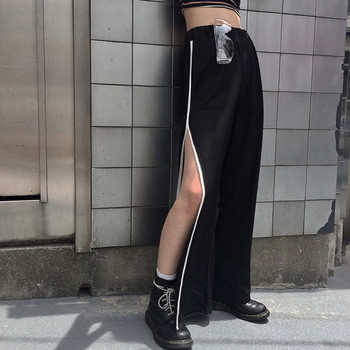 Модерен дамски панталон в широк модел с цепка и висока талия