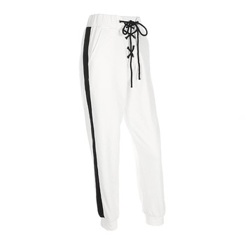 Актуален дамски панталон в бял цвят с висока талия и връзки