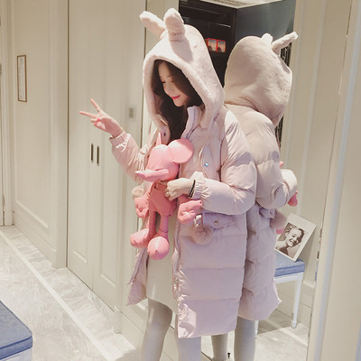 Дамско актуално зимно яке с много интересна качулка със заешки ушички в бебешки розово