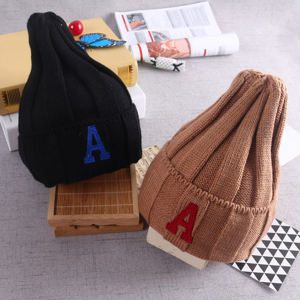 Актуална детска зимна унисекс шапка,най-различни модели и цветове