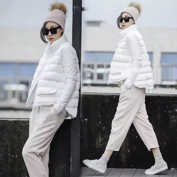Широко зимно дамско яке в бял цвят