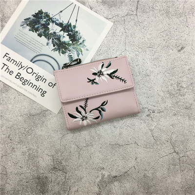 Γυναικείο πορτοφόλι με φυτικά μοτίβα σε διάφορα χρώματα