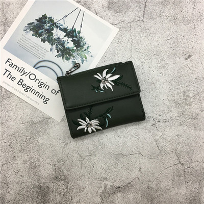 Γυναικείο πορτοφόλι με φυτικά μοτίβα σε διάφορα χρώματα