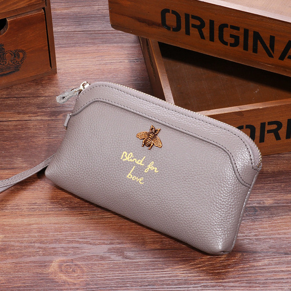 Дамски портфейл с метална декорация в няколко цвята