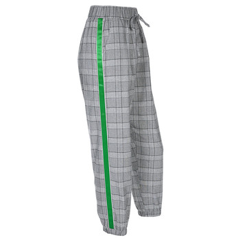 Спортно-елегантен дамски панталон на каре с висока талия и зелена лента