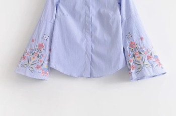 Κομψό γυναικείο πουκάμισο με κομμένα μανίκια και λουλουδιακά μοτίβα