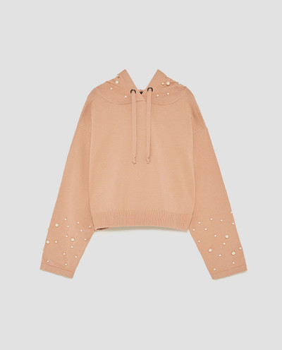 Стилен дамски пуловер с перлички и качулка