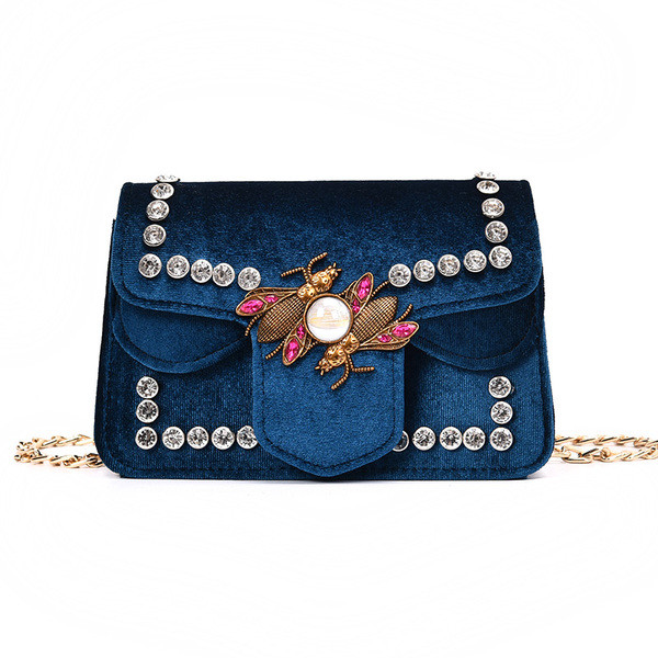 Мини дамска чанта с метална дръжка и декорация