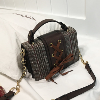 Стилна дамска чанта в три цвята с кръстосани връзки