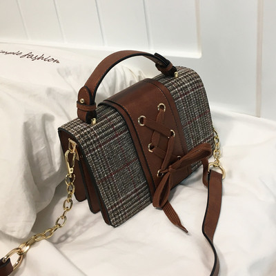 Стилна дамска чанта в три цвята с кръстосани връзки