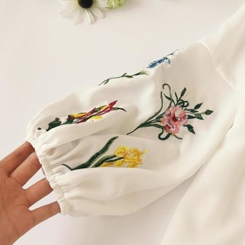 Модерна дамска блуза с кръстосани връзки и интересни широки ръкави с бродерия в различни цветове