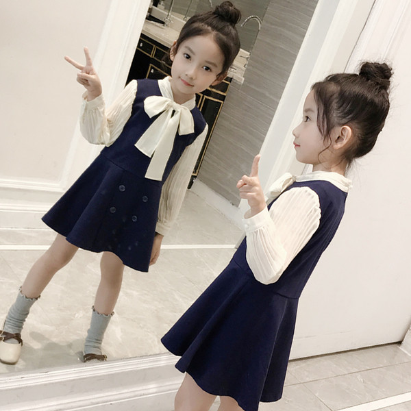 Елегантна дамска рокля с панделка 