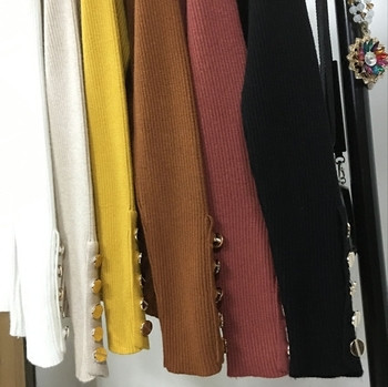 Κομψή γυναικεία μπλούζα, κατάλληλη για καθημερινή τη ζωή με διακοσμητικά κουμπιά στα μανίκια σε διάφορα χρώματα