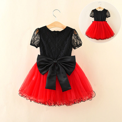 Luxury children`s dress for girls with a large 3D ribbon on the back