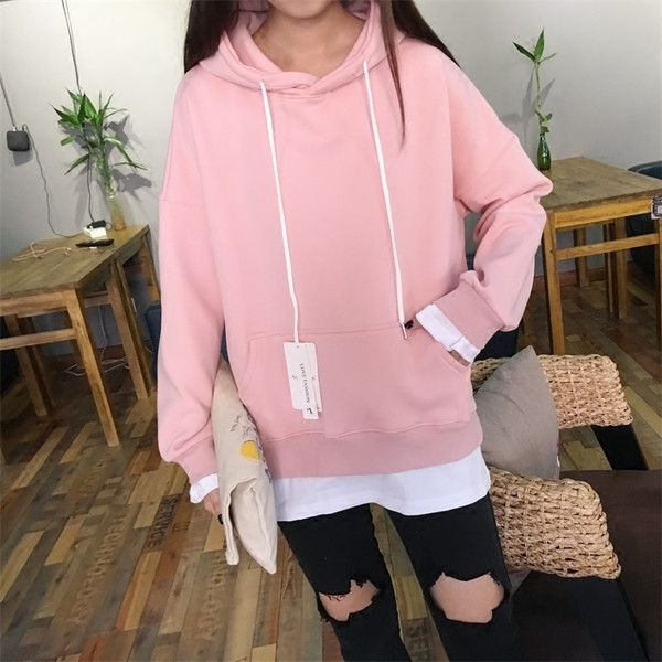 Párnázott, szabad stílusú női pulóver kapucnival és zsebbel