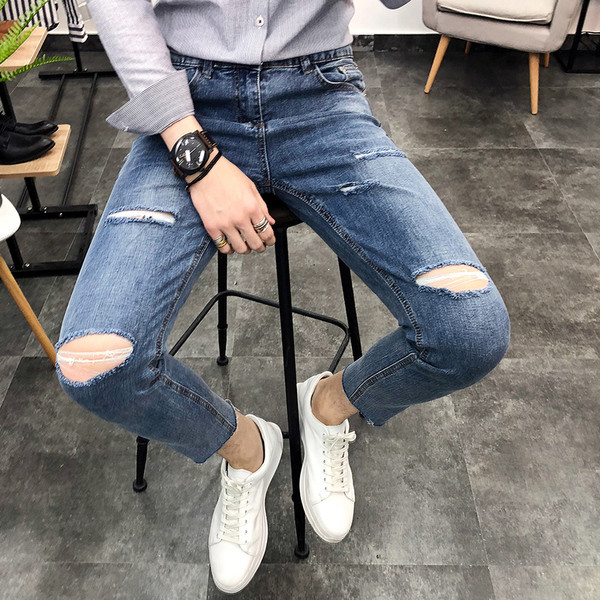 Sportos-elegáns férfi farmer, sötét színű foltokkal