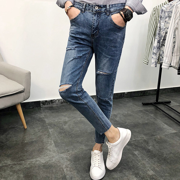 Sportos-elegáns férfi farmer, sötét színű foltokkal