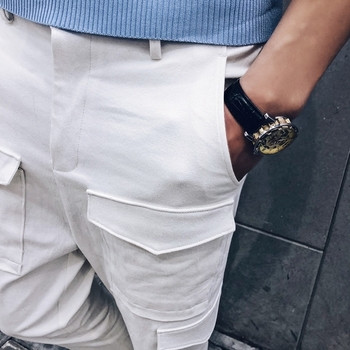 Αντρικά παντελόνια με πλευρικές τσέπες σε άσπρο και μαύρο χρώμα