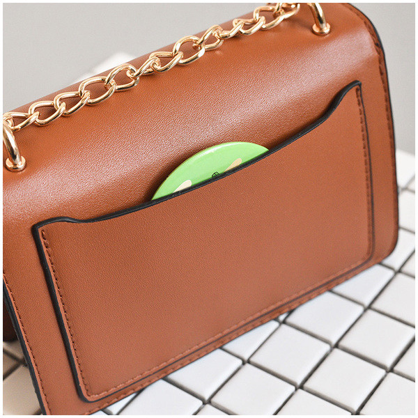 Egyszerű mini női táska hosszú fém fogantyúval