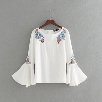 Γυναικεία μπλούζα για το φθινόπωρο και την άνοιξη  με floral μοτίβα σε λευκό χρώμα