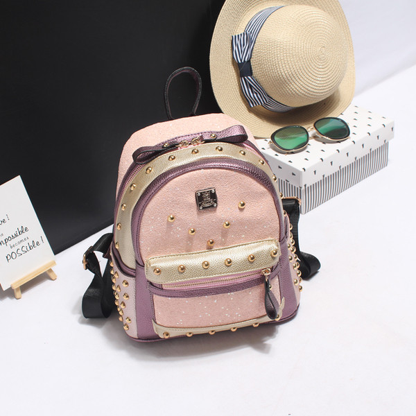 Fényes mini női hátizsák dekoratív szegecsekkel, mindennapi használatra alkalmas három színben