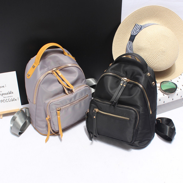 Sport és hétköznapi női hátizsák fekete és szürke színben