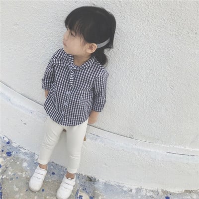 Cămașă elegantă pentru copii în carouri pentru fete, cu o panglică la gât