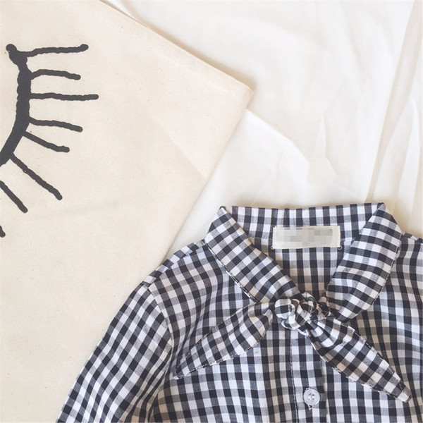 Cămașă elegantă pentru copii în carouri pentru fete, cu o panglică la gât