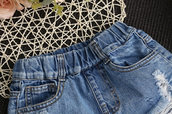 Blugi copii pentru fete cu petice de culoare deschisa