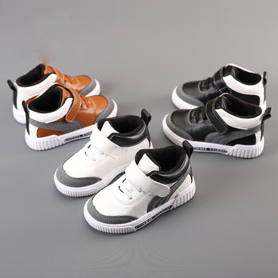 Children`s sports and everyday unisex sneakers with stickers in three colors