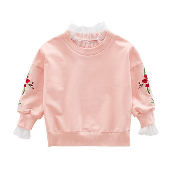 Απαλή παιδική μπλούζα για κορίτσια με κολάρο δαντέλας σε σχήμα Ο και κεντήματα στα μανίκια σε δύο χρώματα