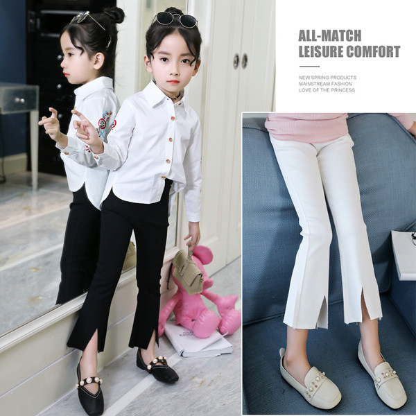 Κομψά παιδικά παντελόνια 9/10 για κορίτσια σε λευκό και μαύρο χρώμα