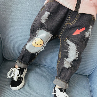 Ενδιαφέρουσα παιδικά τζιν unisex με  emoticons σε δύο χρώματα