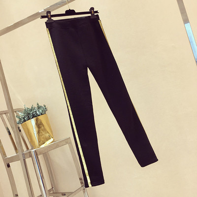 Pantaloni sport de dama in model larg cu margini argintii si aurii