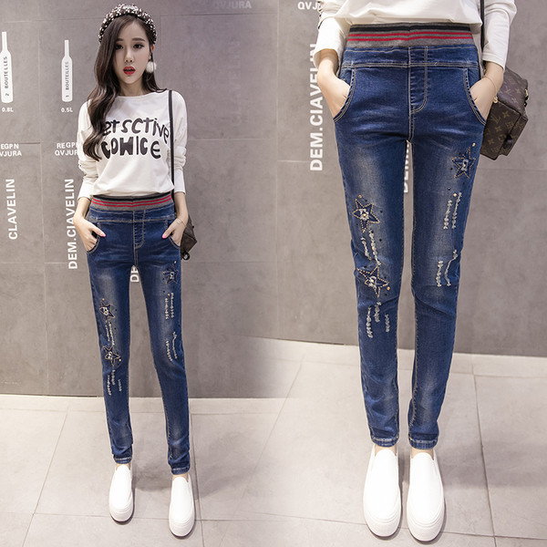 Γυναικεία ελαστικά υψηλά τζιν με κεντήματα και τσέπες