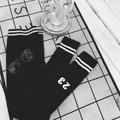 Női fekete sport leggings magas derékkal és felirattal
