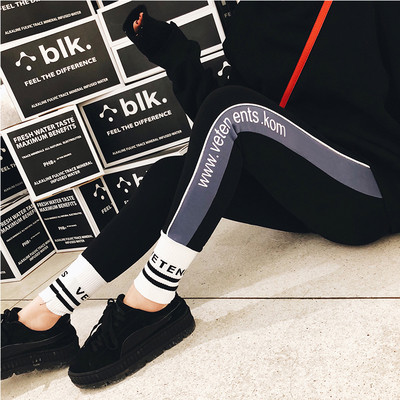Női magas derekú leggings gumival és feliratokkal