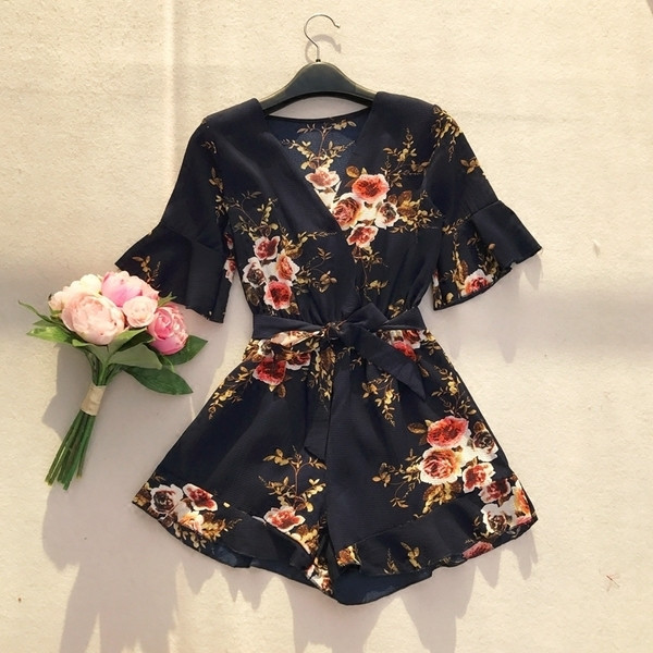 Κομψό καλοκαιρινό ολόσωμο παντελόνι με floral μοτίβο σε σκούρο μπλε χρώμα