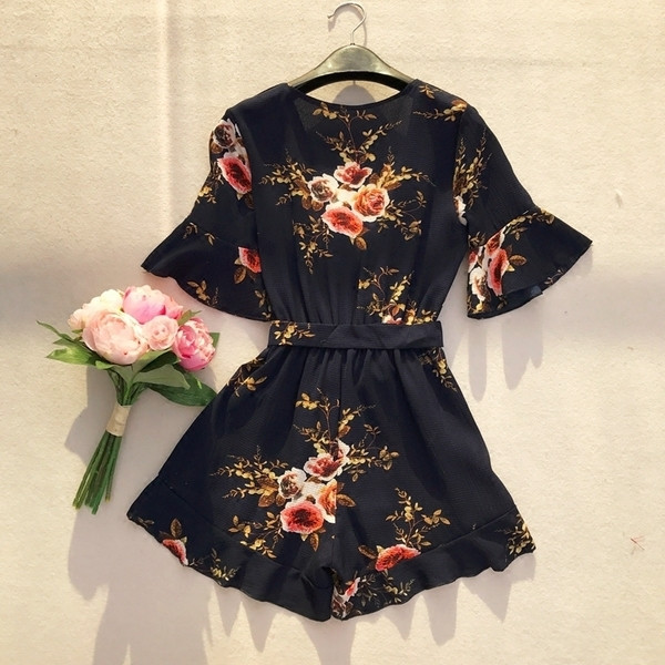 Κομψό καλοκαιρινό ολόσωμο παντελόνι με floral μοτίβο σε σκούρο μπλε χρώμα