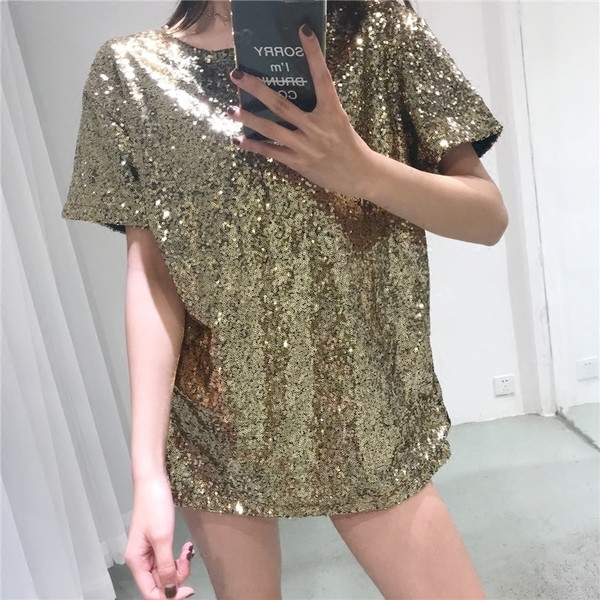 Női blúz fényes flitterekkel széles modellben, különböző színekben