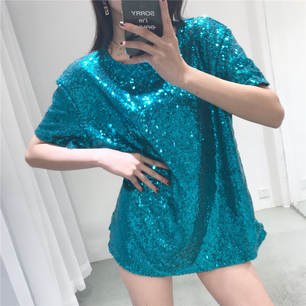 Női blúz fényes flitterekkel széles modellben, különböző színekben