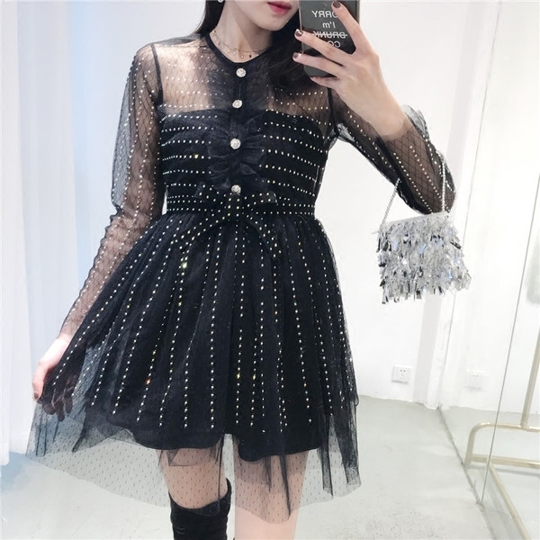 Μαύρο γυναικείο φόρεμα  με πέτρες και δαντέλα