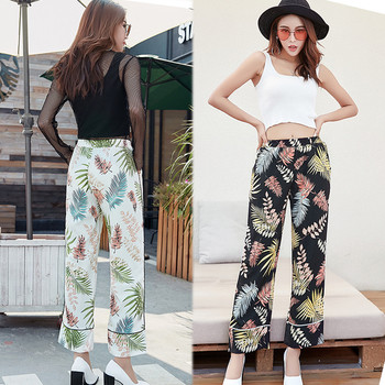 Дамски панталон с висока талия с джобове в два цвята с флорални мотиви