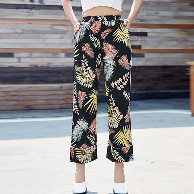 Pantaloni de dama cu talie inalta cu buzunare in doua culori cu motive florale