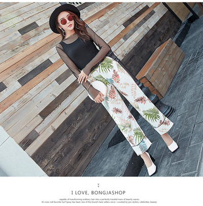 Pantaloni de dama cu talie inalta cu buzunare in doua culori cu motive florale