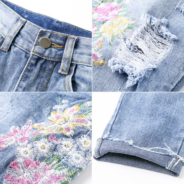 Γυναικεία τζιν με ψηλή μέση και με  σχισμένα στοιχεία και όμορφα κεντήματα