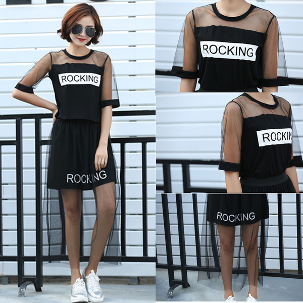 Μοντέρνό γυναικείο σύνολο  σε δύο κομμάτια μπλούζα + φούστα σε μαύρο χρώμα