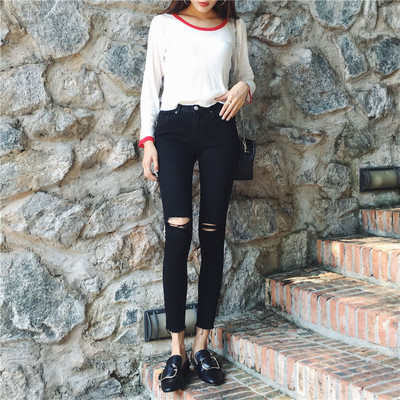 Pantaloni de damă cu talie înaltă cu elemente rupte